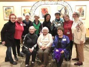 A group of women posing for a picture.