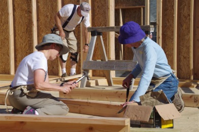 A group of people working on construction.